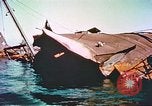 Image of damaged ship Manila Philippines, 1945, second 56 stock footage video 65675058923