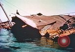 Image of damaged ship Manila Philippines, 1945, second 57 stock footage video 65675058923