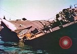 Image of damaged ship Manila Philippines, 1945, second 60 stock footage video 65675058923
