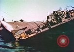 Image of damaged ship Manila Philippines, 1945, second 61 stock footage video 65675058923