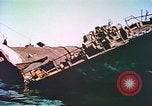 Image of damaged ship Manila Philippines, 1945, second 62 stock footage video 65675058923