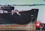 Image of damaged ship Manila Philippines, 1945, second 1 stock footage video 65675058924