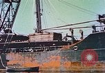 Image of damaged ship Manila Philippines, 1945, second 7 stock footage video 65675058924
