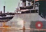 Image of damaged ship Manila Philippines, 1945, second 17 stock footage video 65675058924