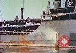 Image of damaged ship Manila Philippines, 1945, second 18 stock footage video 65675058924
