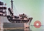 Image of damaged ship Manila Philippines, 1945, second 32 stock footage video 65675058924