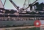 Image of damaged ship Manila Philippines, 1945, second 39 stock footage video 65675058924