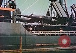 Image of damaged ship Manila Philippines, 1945, second 49 stock footage video 65675058924