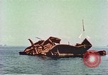 Image of damaged ship Manila Philippines, 1945, second 50 stock footage video 65675058924