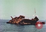 Image of damaged ship Manila Philippines, 1945, second 51 stock footage video 65675058924
