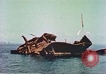 Image of damaged ship Manila Philippines, 1945, second 53 stock footage video 65675058924