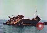 Image of damaged ship Manila Philippines, 1945, second 54 stock footage video 65675058924