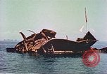 Image of damaged ship Manila Philippines, 1945, second 55 stock footage video 65675058924