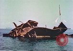 Image of damaged ship Manila Philippines, 1945, second 56 stock footage video 65675058924