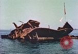Image of damaged ship Manila Philippines, 1945, second 57 stock footage video 65675058924