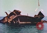 Image of damaged ship Manila Philippines, 1945, second 59 stock footage video 65675058924
