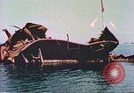 Image of damaged ship Manila Philippines, 1945, second 60 stock footage video 65675058924