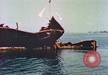 Image of damaged ship Manila Philippines, 1945, second 62 stock footage video 65675058924
