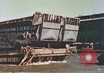 Image of damaged landing crafts Manila Philippines, 1945, second 12 stock footage video 65675058932