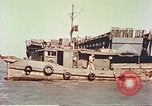 Image of damaged landing crafts Manila Philippines, 1945, second 16 stock footage video 65675058932
