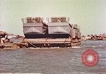 Image of damaged landing crafts Manila Philippines, 1945, second 26 stock footage video 65675058932