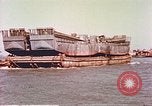 Image of damaged landing crafts Manila Philippines, 1945, second 30 stock footage video 65675058932