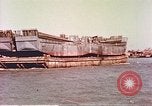 Image of damaged landing crafts Manila Philippines, 1945, second 31 stock footage video 65675058932