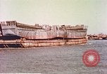 Image of damaged landing crafts Manila Philippines, 1945, second 32 stock footage video 65675058932