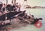Image of damaged landing crafts Manila Philippines, 1945, second 34 stock footage video 65675058932