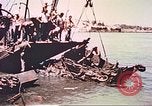 Image of damaged landing crafts Manila Philippines, 1945, second 37 stock footage video 65675058932