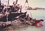 Image of damaged landing crafts Manila Philippines, 1945, second 38 stock footage video 65675058932