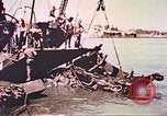 Image of damaged landing crafts Manila Philippines, 1945, second 39 stock footage video 65675058932