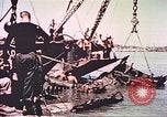 Image of damaged landing crafts Manila Philippines, 1945, second 58 stock footage video 65675058932