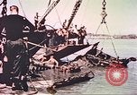 Image of damaged landing crafts Manila Philippines, 1945, second 59 stock footage video 65675058932