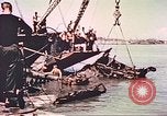 Image of damaged landing crafts Manila Philippines, 1945, second 60 stock footage video 65675058932