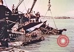 Image of damaged landing crafts Manila Philippines, 1945, second 61 stock footage video 65675058932
