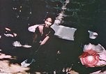Image of Filipino civilians Manila Philippines, 1945, second 18 stock footage video 65675058934
