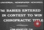 Image of chiropractors examining babies Los Angeles California USA, 1931, second 1 stock footage video 65675058948