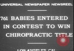 Image of chiropractors examining babies Los Angeles California USA, 1931, second 6 stock footage video 65675058948