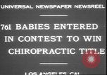 Image of chiropractors examining babies Los Angeles California USA, 1931, second 8 stock footage video 65675058948