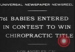 Image of chiropractors examining babies Los Angeles California USA, 1931, second 9 stock footage video 65675058948