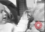 Image of chiropractors examining babies Los Angeles California USA, 1931, second 16 stock footage video 65675058948