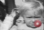 Image of chiropractors examining babies Los Angeles California USA, 1931, second 17 stock footage video 65675058948