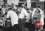 Image of chiropractors examining babies Los Angeles California USA, 1931, second 22 stock footage video 65675058948