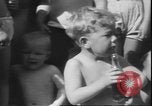 Image of chiropractors examining babies Los Angeles California USA, 1931, second 25 stock footage video 65675058948