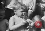 Image of chiropractors examining babies Los Angeles California USA, 1931, second 26 stock footage video 65675058948