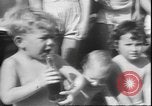 Image of chiropractors examining babies Los Angeles California USA, 1931, second 27 stock footage video 65675058948