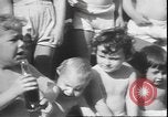 Image of chiropractors examining babies Los Angeles California USA, 1931, second 28 stock footage video 65675058948