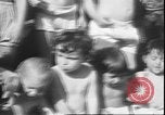 Image of chiropractors examining babies Los Angeles California USA, 1931, second 29 stock footage video 65675058948