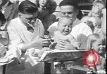 Image of chiropractors examining babies Los Angeles California USA, 1931, second 35 stock footage video 65675058948